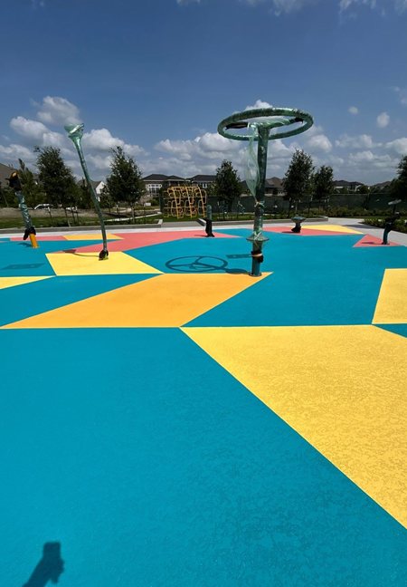 colorful splash pad coating Prairieland Village